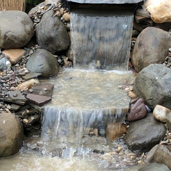 Schwarz Ponds - a small waterfall flowing over rocks - General Contractors Near Me - Bird In Hand, Pennsylvania Schwarz Ponds - a small waterfall flowing over rocks - General Contractors Near Me - Bird In Hand, Pennsylvania