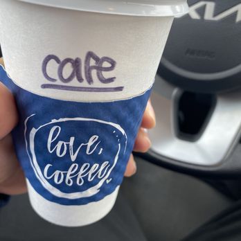 Love Coffee - a hand holding a cup of coffee - Coffee & Tea Near Me - Lee's Summit, Missouri Love Coffee - a hand holding a cup of coffee - Coffee & Tea Near Me - Lee's Summit, Missouri