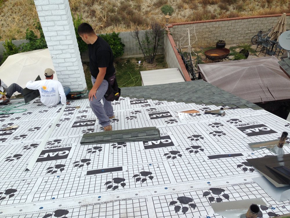 Slide of JW Roofing Services