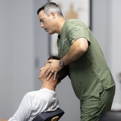 Falls Clinic Of Chiropractic - Dr. David Cartwright Treating A Patient
