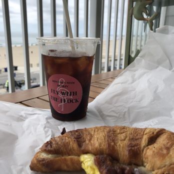 Flamingos Coffee Bar - Small cold brew and bacon birdie sandwich - Coffee & Tea Near Me - Hampton, New Hampshire