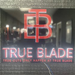 True Blade Barbershop - Barbershop emblem