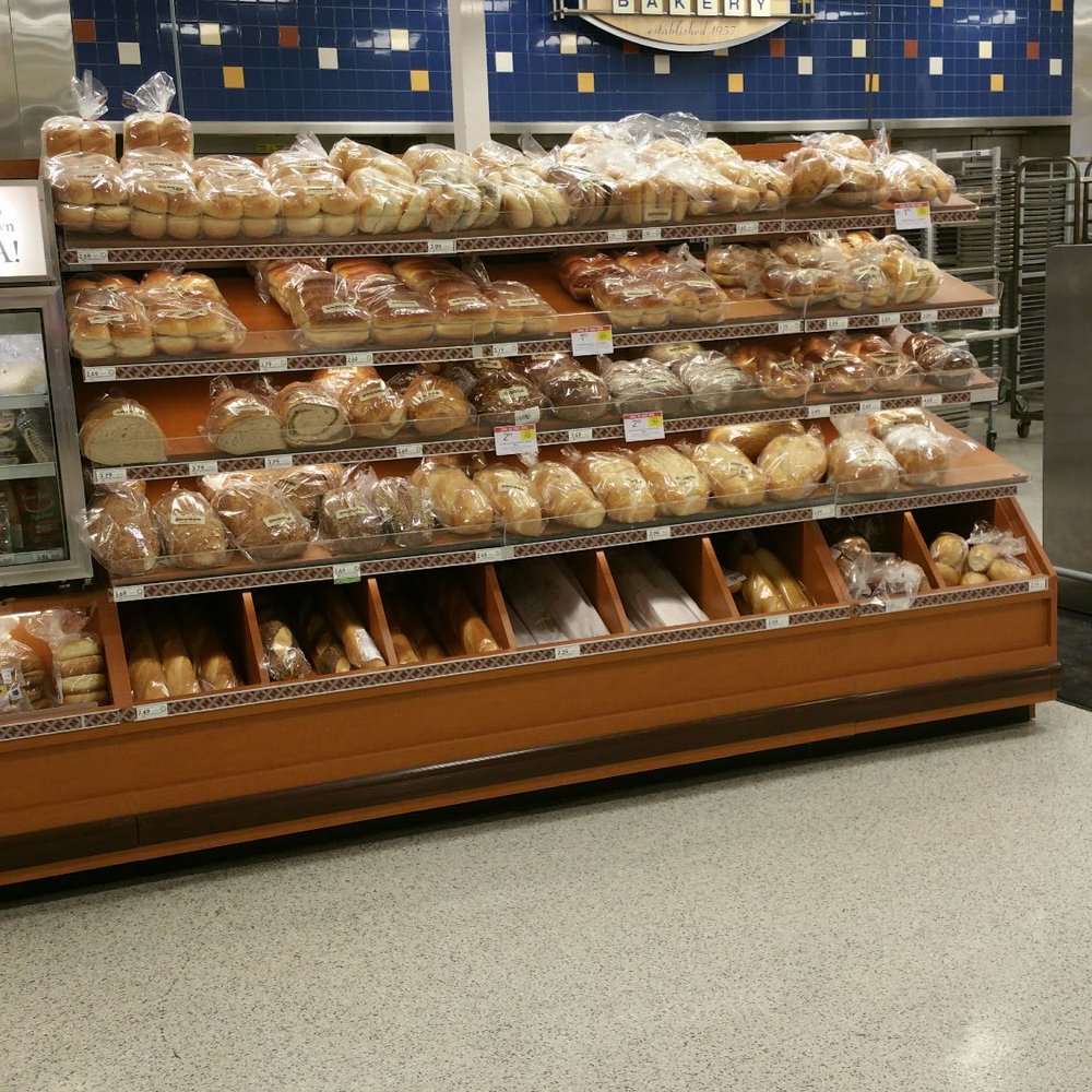 a shopping cart in a grocery store a shopping cart in a grocery store
