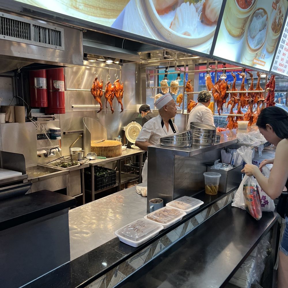 Corner 28 - a restaurant kitchen with people working - Chinese Near Me - Flushing, New York Corner 28 - a restaurant kitchen with people working - Chinese Near Me - Flushing, New York