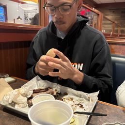 Spare Ribs Platter was delicious as you can tell by my very satisfied friend.
