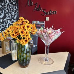 Absolutely Fabulous Salon - They always have fresh flowers and yummy candy.