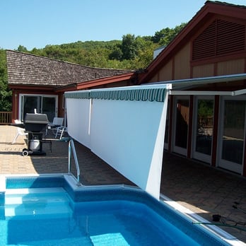 Sondrini Enterprises - Retractable drop valances allow you to blow the low eastern and western sun. - Roofing Near Me - Pittsfield, Massachusetts