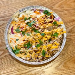 NY Chicken & Rice - Grilled Chicken over white rice w. Red onion, feta cheese, spicy feta dip, shredded carrots, spicy mayo sauce