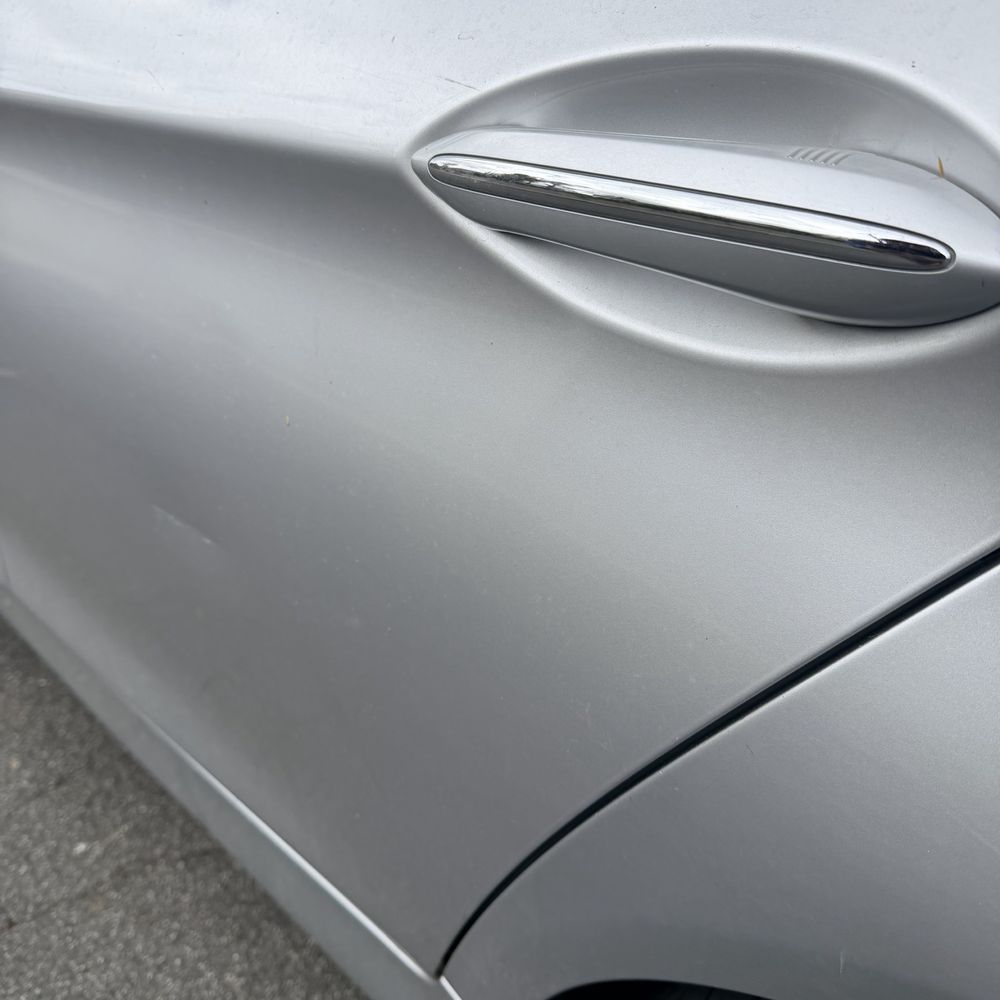 My Dent Guy - Before. Scratch and dent in the middle of the door and bulge below door handle - Mobile Dent Repair Near Me My Dent Guy - Before. Scratch and dent in the middle of the door and bulge below door handle - Mobile Dent Repair Near Me