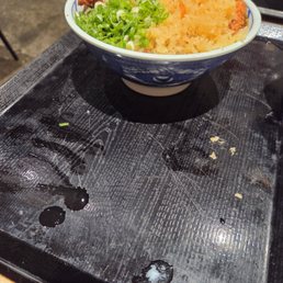 Katsu Bowl on a dirty tray with semi raw egg whites....