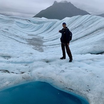 Root Glacier Trail - A blue pool in front of me and scenic backdrop. - Hiking Near Me