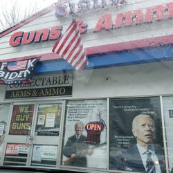 619 DW Guns & Ammo - The little white mask sign on the door and on the stand beside the door insist that I will be placed at risk to enter.