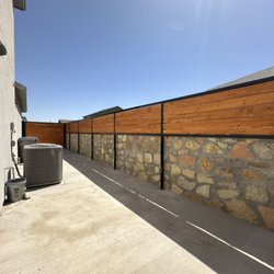 J&M Awnings and More - Wood with metal fence