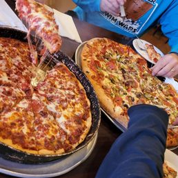 Large Deep Dish Meatza and X-Large Hand Tossed Gramboli's Special plus 4 drinks $91.00 ???