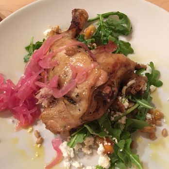 Poppycocks - Chicken Confit- Duck fat roasted chicken, roasted sweet potatoes and parsnips, farro, arugula, goat cheese, candied red onions - New American Near Me - Traverse City, Michigan Poppycocks - Chicken Confit- Duck fat roasted chicken, roasted sweet potatoes and parsnips, farro, arugula, goat cheese, candied red onions - New American Near Me - Traverse City, Michigan