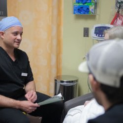 His Choice Vasectomy Raleigh - Dr. Monteith consulting with patients.