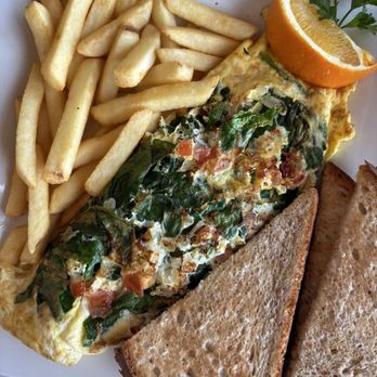 Keke's Breakfast Cafe - Greek Omelette with fries and multigrain toast - Breakfast & Brunch Near Me - Stuart, Florida