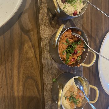 Paramount Fine Foods - three bowls of food on a table - Middle Eastern Near Me - Milton, Ontario Paramount Fine Foods - three bowls of food on a table - Middle Eastern Near Me - Milton, Ontario