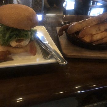 Bosscat Kitchen & Libations - The chicken sandwich and fries - New American Near Me - Houston, Texas