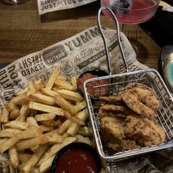Grind - Shrimp and fries in front, House burger in the back with house cut fries