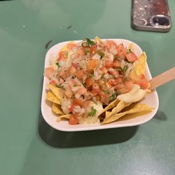 100%Tacos - Chips with queso and salsa