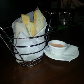 Rusty Scupper - Sourdough bread appetizer with dipping sauce - Seafood Near Me - Baltimore, Maryland