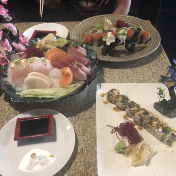 Bushido Sushi SRQ - Sashimi Platter, Eel Roll. Magic Samon and tasty roll - Sushi Bars Near Me - Sarasota, Florida