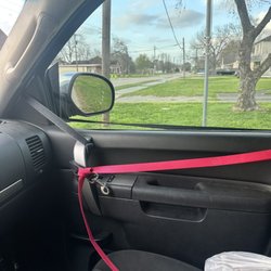 BayWash - mirror held up by dog leashes