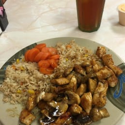 Hibachi grilled chicken with rice, yummy carrots and their famous house sauce on the side.
