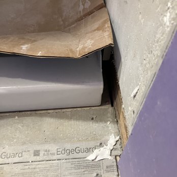Father and Son Construction Services - They didn't fir out the wall to fit the new pan! - General Contractors Near Me