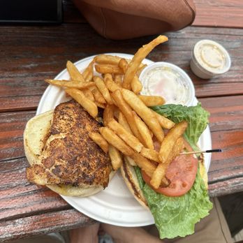 Hernando Beach Tropical Grille - Blackened grouper sandwich, coleslaw, chipotle tartar sauce - American Near Me - Hernando Beach, Florida