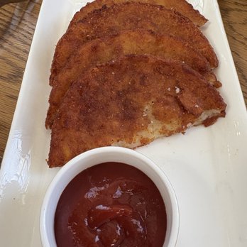 Leluia Hall - Half moon potato cakes - Steakhouses Near Me - Charlotte, North Carolina