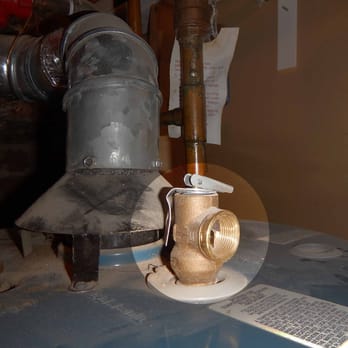 Russell Layton Associates - Safety issues such as the water heater pressure relief valve not having an extension pipe. - Home Inspectors Near Me Russell Layton Associates - Safety issues such as the water heater pressure relief valve not having an extension pipe. - Home Inspectors Near Me