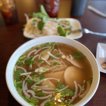 Pho Vi-Vi - a bowl of pho - vi veggie soup with a spoon - Vietnamese Near Me - Pearland, Texas Pho Vi-Vi - a bowl of pho - vi veggie soup with a spoon - Vietnamese Near Me - Pearland, Texas