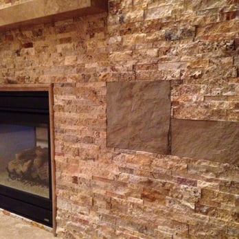 Italian Heritage Tile & Stone - Focal wall using a Scabos Stack Stone and large varying sized slate tiles. - General Contractors Near Me Italian Heritage Tile & Stone - Focal wall using a Scabos Stack Stone and large varying sized slate tiles. - General Contractors Near Me