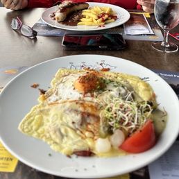Bratwurst and fries and Alpler Rosti Bratwurst and fries and Alpler Rosti