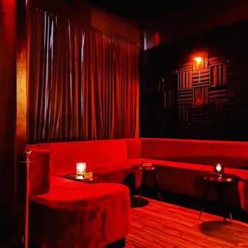 Miami Sound Bar - a red couch and two chairs - Bars Near Me - Miami, Florida Miami Sound Bar - a red couch and two chairs - Bars Near Me - Miami, Florida