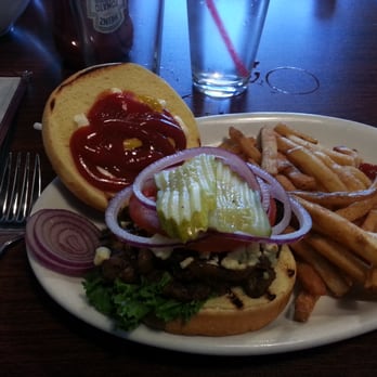 Running Rooster - Yummy burger with crumbled blue cheese and caramelized onions. - American Near Me - Hollister, California Running Rooster - Yummy burger with crumbled blue cheese and caramelized onions. - American Near Me - Hollister, California