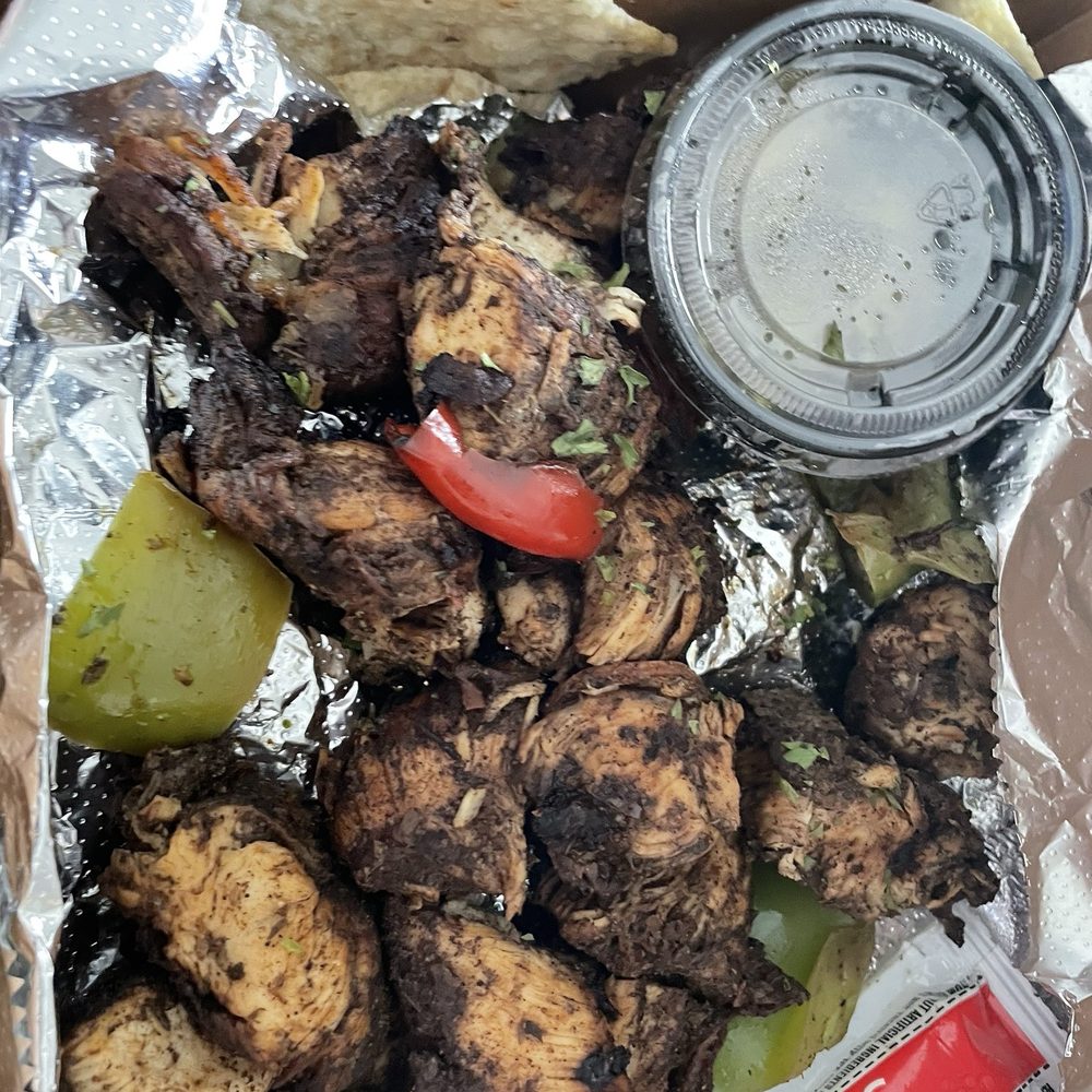Bussin Jerk ATL - Jerk chicken nachos - Food Trucks Near Me - Dunwoody, Georgia Bussin Jerk ATL - Jerk chicken nachos - Food Trucks Near Me - Dunwoody, Georgia