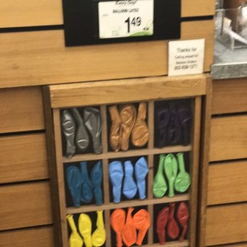 Safeway - a display of shoes in a shoe store - Grocery Near Me - Boulder, Colorado