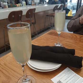 Urban Crust - Mimosas in the bar area - Pizza Near Me - Plano, Texas Urban Crust - Mimosas in the bar area - Pizza Near Me - Plano, Texas