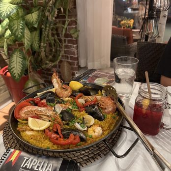 Tapelia - Seafood paella, pitcher of sangria. - Spanish Near Me - Miami Beach, Florida Tapelia - Seafood paella, pitcher of sangria. - Spanish Near Me - Miami Beach, Florida