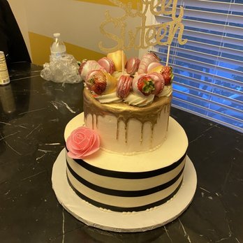 Charles Street Bakery and Cafe - First cake We added the flowers and the topper - Bakeries Near Me - La Plata, Maryland