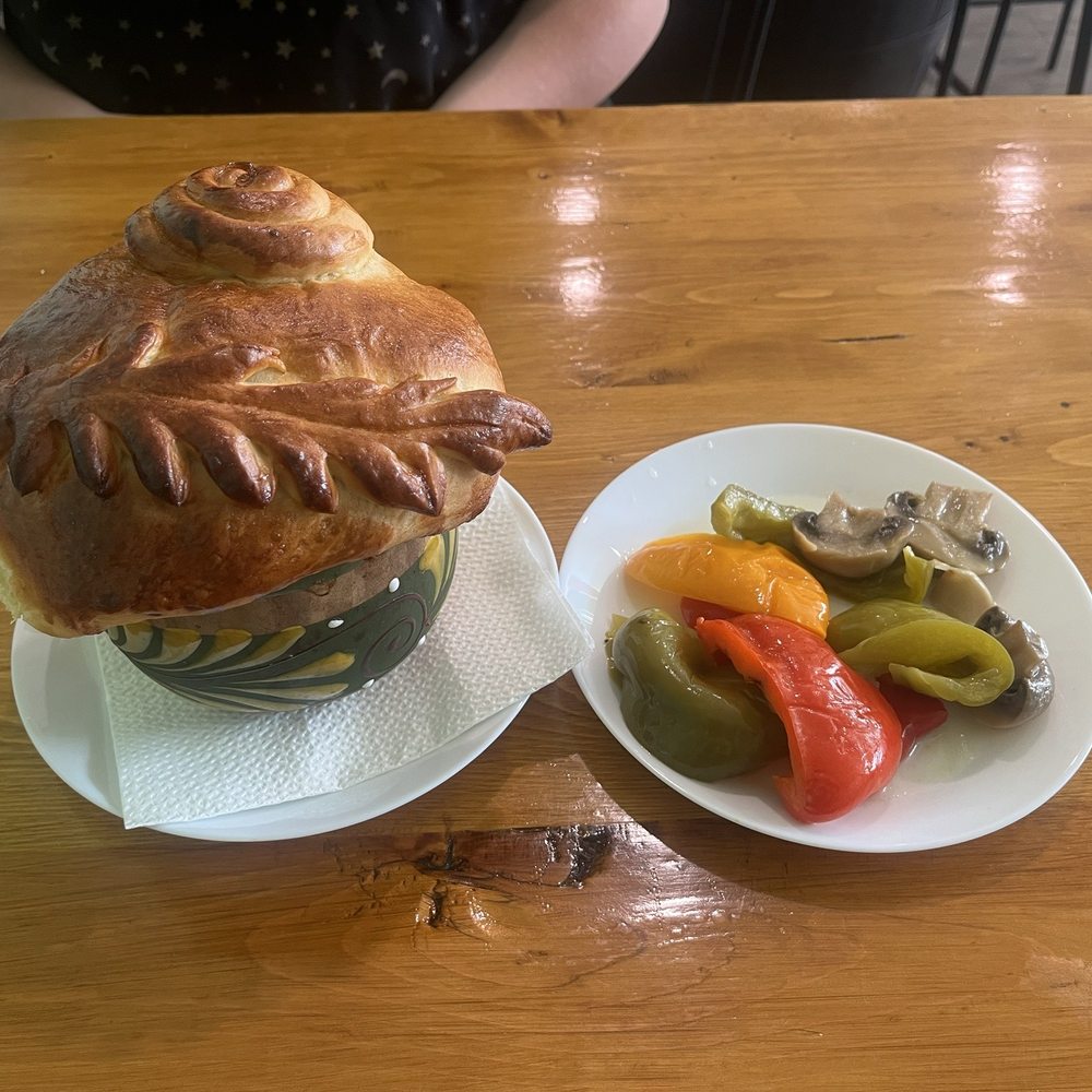 Olesya's Kitchen - Clay pot and veggies served. It is like a stew with a beautiful loaf of bread on top. - Ukrainian Near Me - Columbus, Indiana Olesya's Kitchen - Clay pot and veggies served. It is like a stew with a beautiful loaf of bread on top. - Ukrainian Near Me - Columbus, Indiana