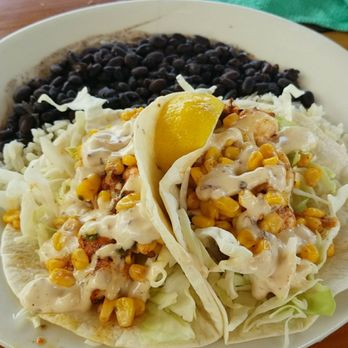 The Conch House Restaurant - Shrimp tacos with coconut rice and black beans - Caribbean Near Me - Saint Augustine, Florida The Conch House Restaurant - Shrimp tacos with coconut rice and black beans - Caribbean Near Me - Saint Augustine, Florida