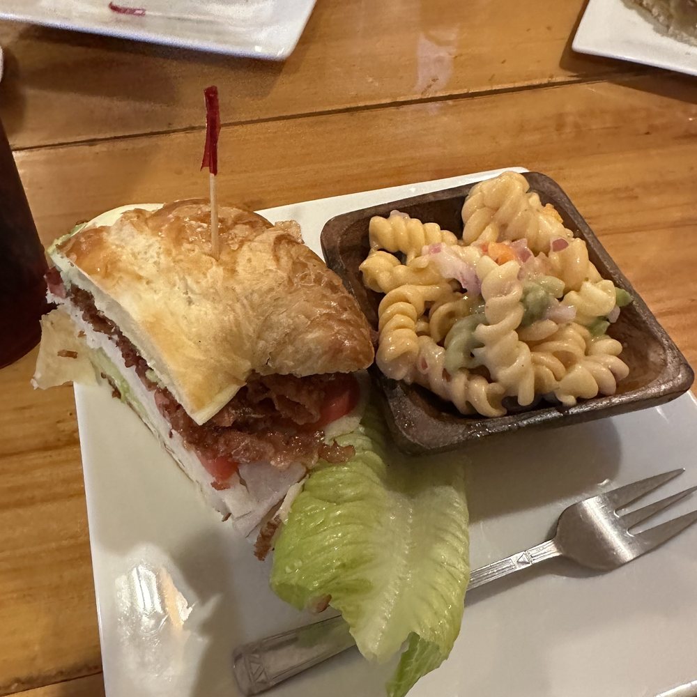 Cafe Budapest - a plate of food with a sandwich and macaroni salad - Bakeries Near Me - Fitzgerald, Georgia