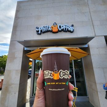 Philz Coffee - a hand holding a cup of coffee - Coffee & Tea Near Me - Palo Alto, California Philz Coffee - a hand holding a cup of coffee - Coffee & Tea Near Me - Palo Alto, California