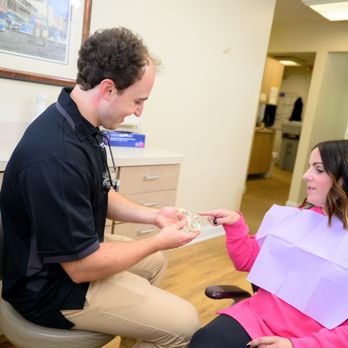 Naamans Dental - Reviewing treatment options with a patient at Naamans Dental - General Dentistry Near Me - Wilmington, Delaware Naamans Dental - Reviewing treatment options with a patient at Naamans Dental - General Dentistry Near Me - Wilmington, Delaware