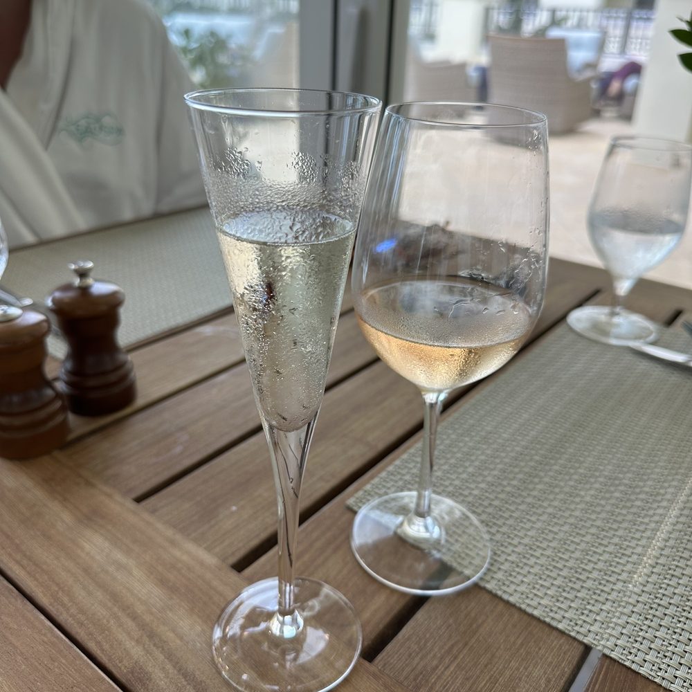 Polpo Palm Beach - two glasses of wine on a table - New American Near Me - Manalapan, Florida Polpo Palm Beach - two glasses of wine on a table - New American Near Me - Manalapan, Florida