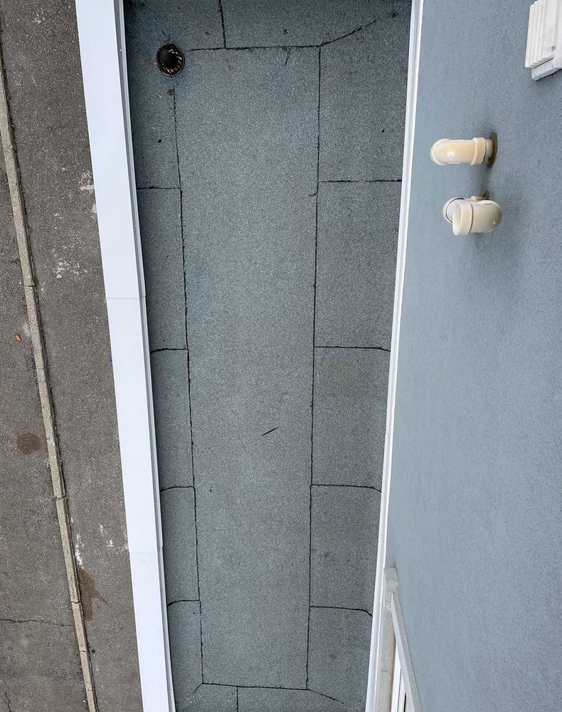 Slide of Lummus Park Roofing